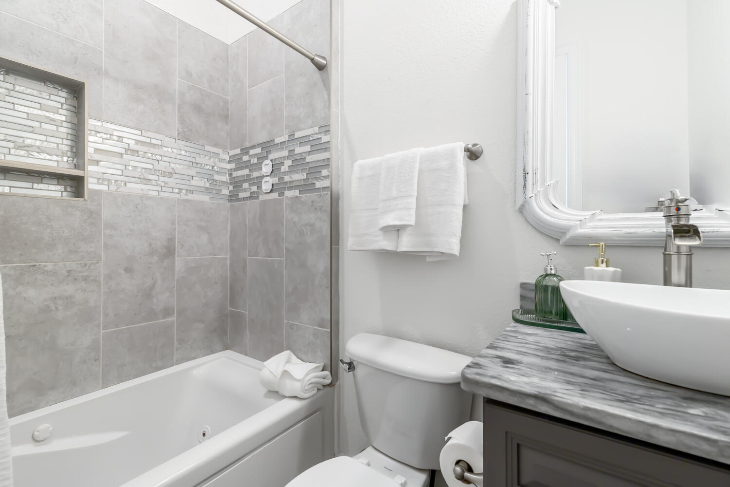337 Grande Pointe Circle Inlet Beach, FL 32461 - Photo 33 of 73 a bathroom with a granite countertop bathtub sink vanity mirror and toilet