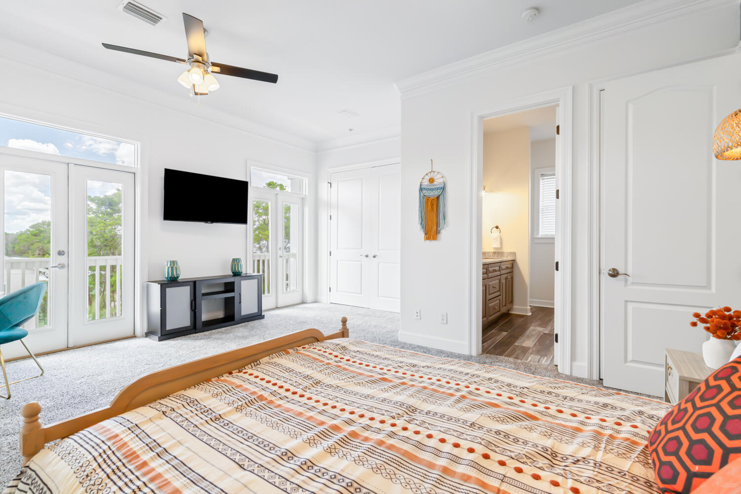 337 Grande Pointe Circle Inlet Beach, FL 32461 - Photo 36 of 73 a spacious bedroom with a bed and a flat screen tv