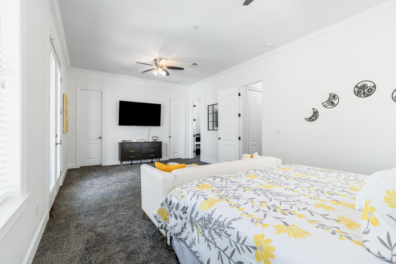 337 Grande Pointe Circle Inlet Beach, FL 32461 - Photo 42 of 73 a spacious bedroom with a bed and a flat screen tv