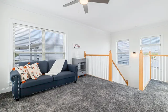 a view of a lake with sitting area