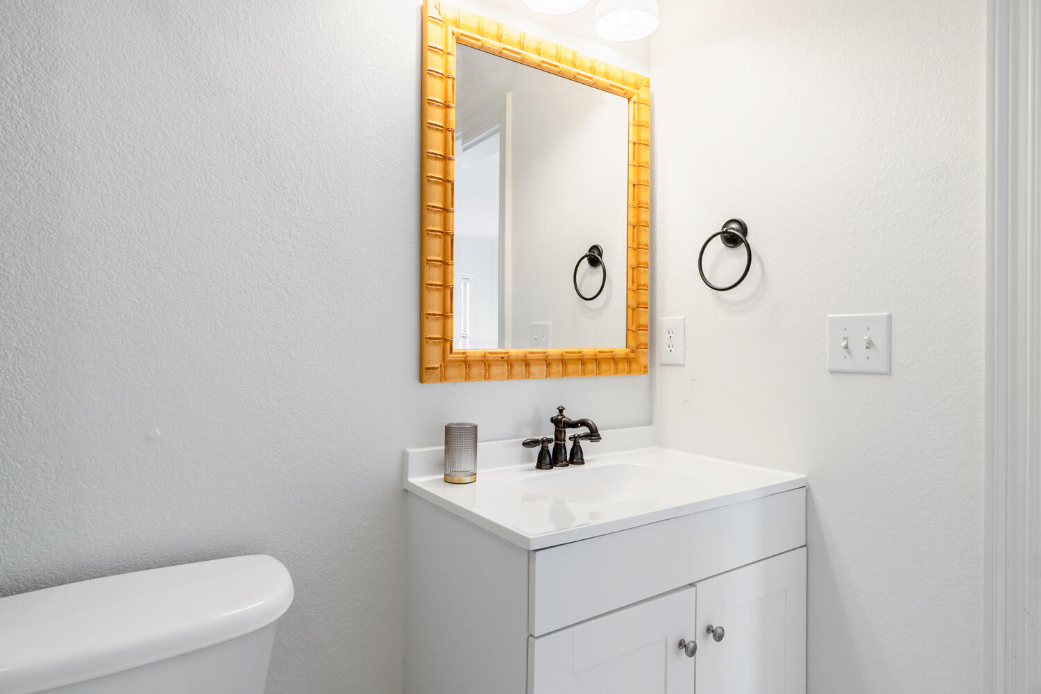 337 Grande Pointe Circle Inlet Beach, FL 32461 - Photo 51 of 73 a bathroom with a sink a toilet and mirror