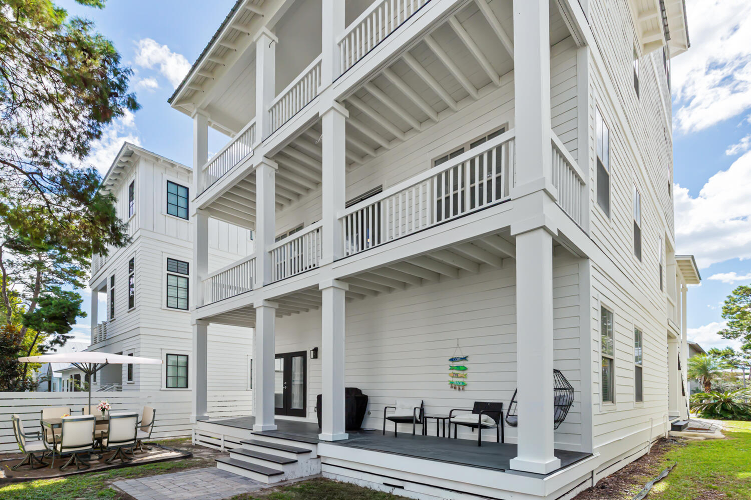 337 Grande Pointe Circle Inlet Beach, FL 32461 - Photo 54 of 73 a view of a white building among the street