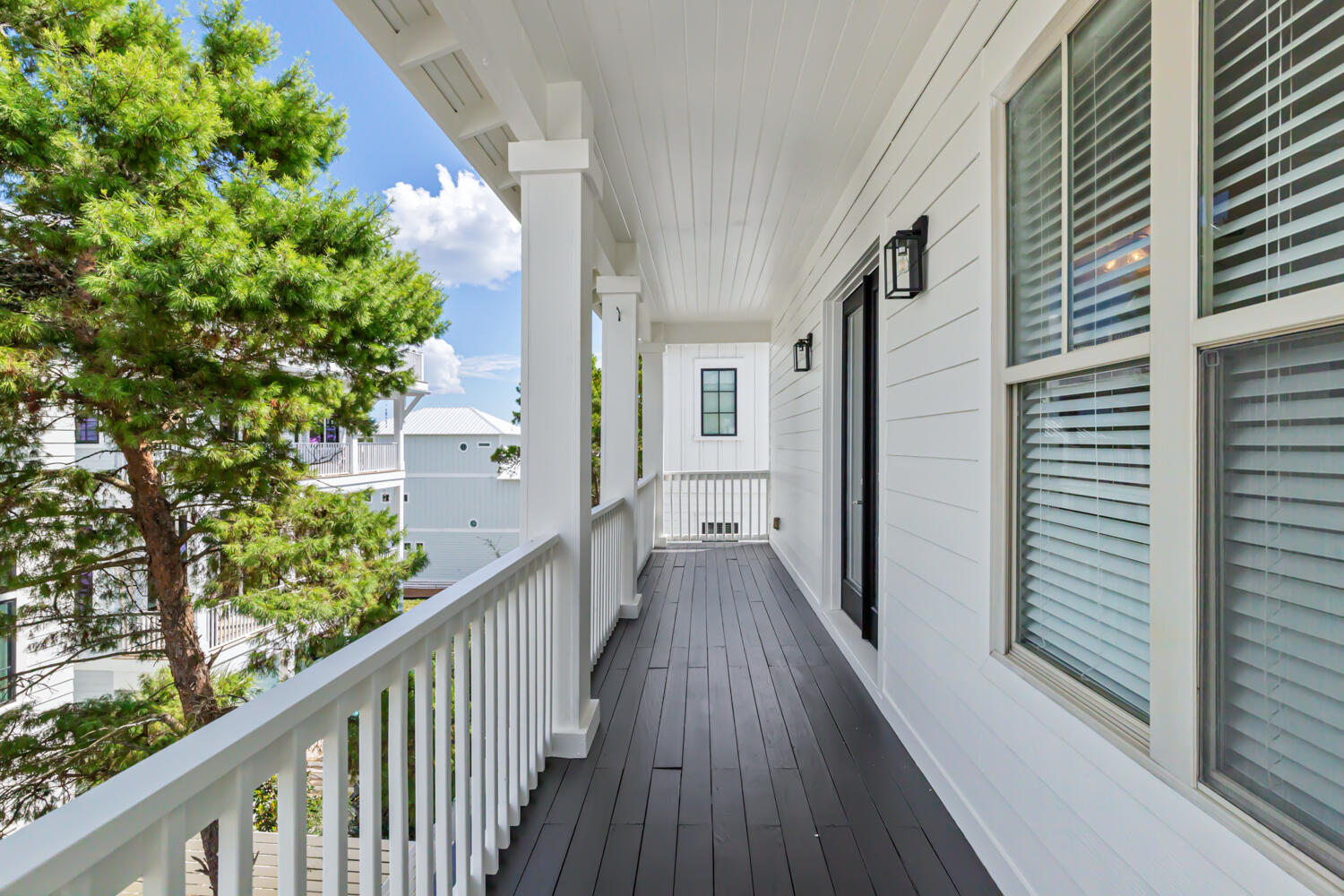 337 Grande Pointe Circle Inlet Beach, FL 32461 - Photo 59 of 73 a view of a balcony with wooden floor