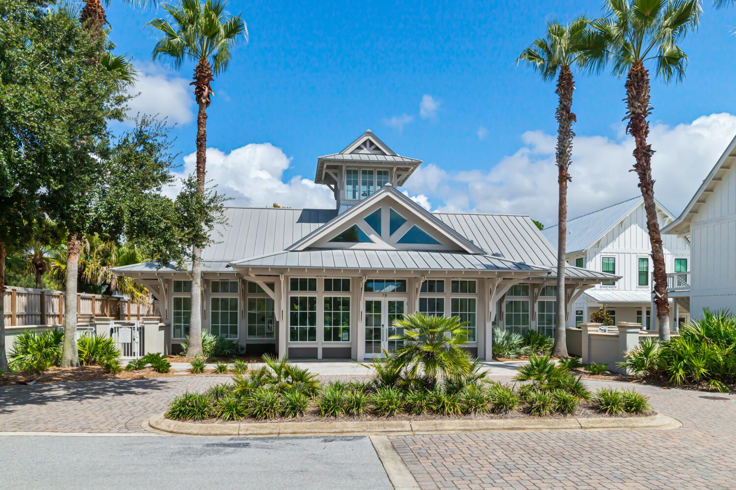 337 Grande Pointe Circle Inlet Beach, FL 32461 - Photo 64 of 73 a front view of a house with a yard and potted plants