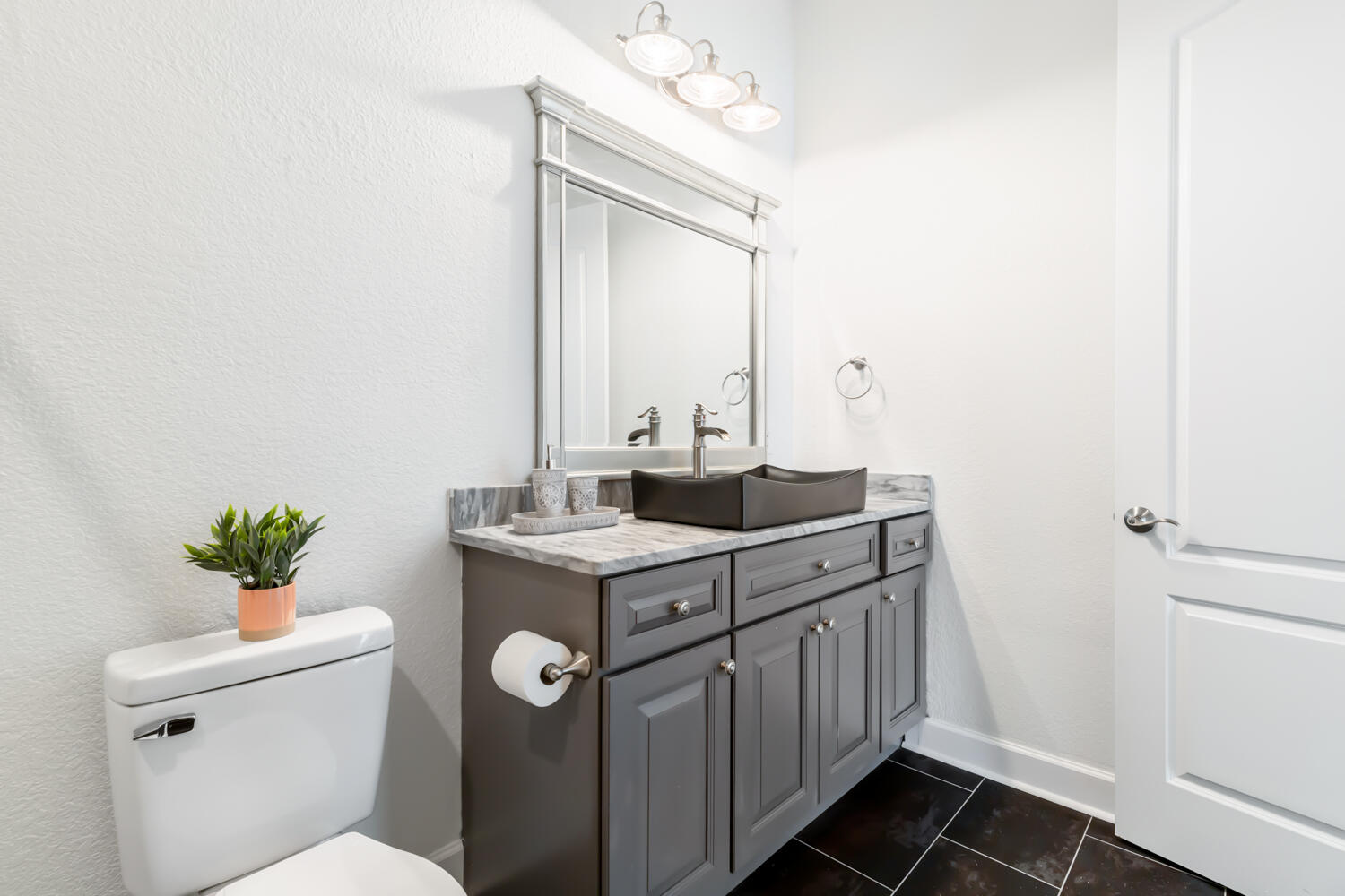 337 Grande Pointe Circle Inlet Beach, FL 32461 - Photo 9 of 73 a bathroom with a granite countertop sink a toilet and a mirror