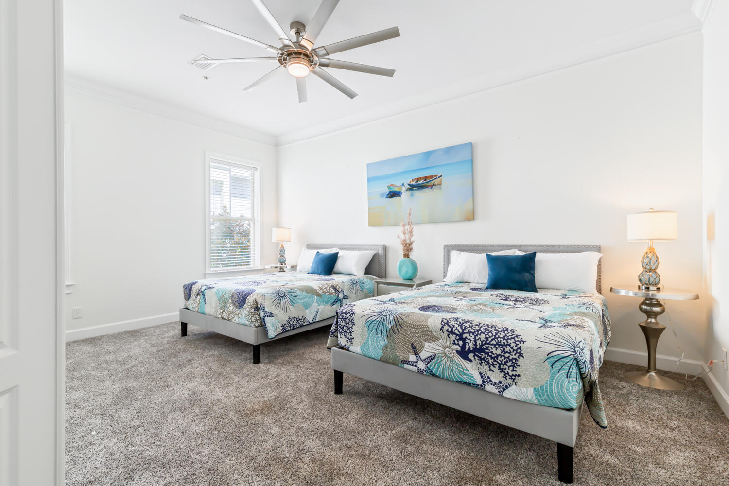 337 Grande Pointe Circle Inlet Beach, FL 32461 - Photo 10 of 73 a bedroom with a bed and a chandelier