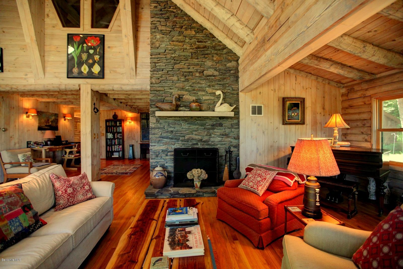 26 Mc Carthy Road Tyringham, MA 01264 - Photo 12 of 31 a living room with furniture fireplace and flat screen tv