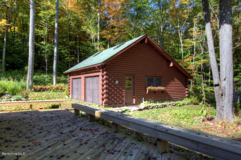 26 Mc Carthy Road Tyringham, MA 01264 - Photo 15 of 31 a view of a house with backyard and garden