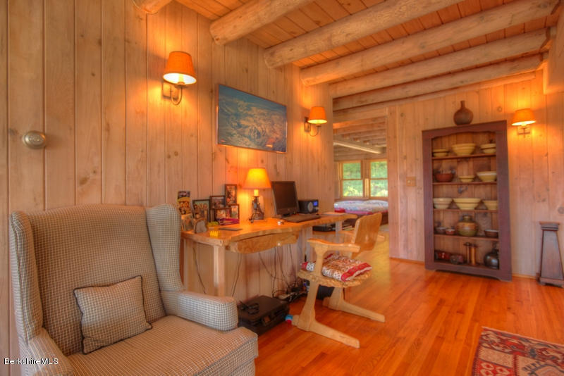 26 Mc Carthy Road Tyringham, MA 01264 - Photo 19 of 31 a living room with furniture and a wooden floor