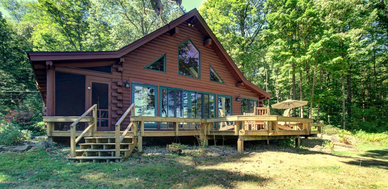 26 Mc Carthy Road Tyringham, MA 01264 - Photo 5 of 31 a view of a house with backyard