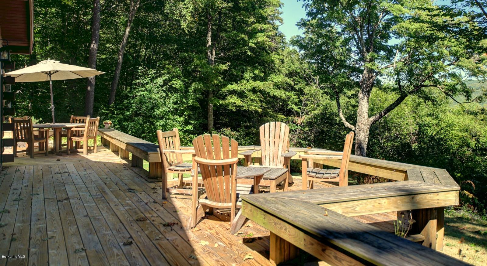 26 Mc Carthy Road Tyringham, MA 01264 - Photo 7 of 31 a view of deck with furniture and barbeque oven
