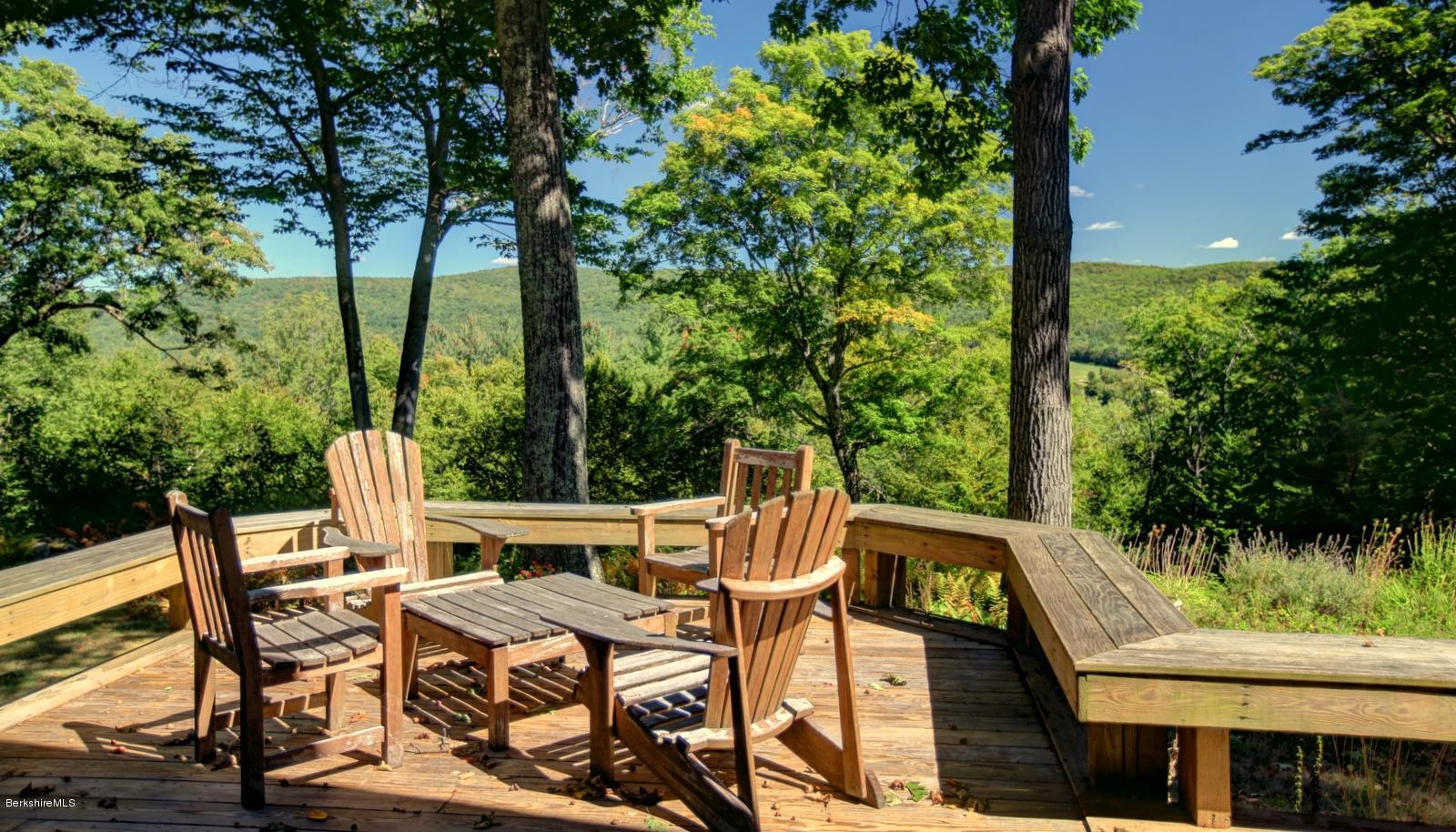 26 Mc Carthy Road Tyringham, MA 01264 - Photo 8 of 31 a view of a chairs and table in patio