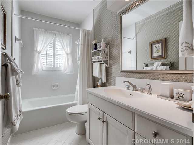 2935 Wheelock Road Charlotte, NC 28211 - Photo 11 of 16 a bathroom with a sink a toilet and a bathtub