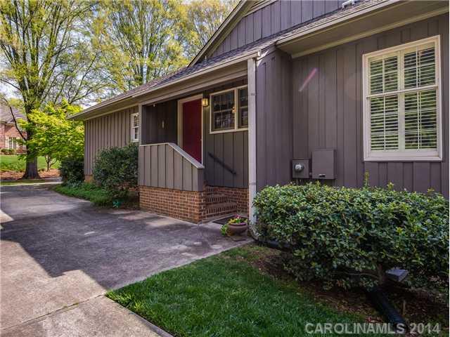 2935 Wheelock Road Charlotte, NC 28211 - Photo 15 of 16 a view of a house with a yard and plants