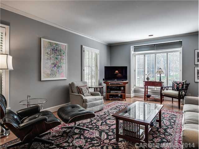 2935 Wheelock Road Charlotte, NC 28211 - Photo 4 of 16 a living room with furniture a flat screen tv and a window