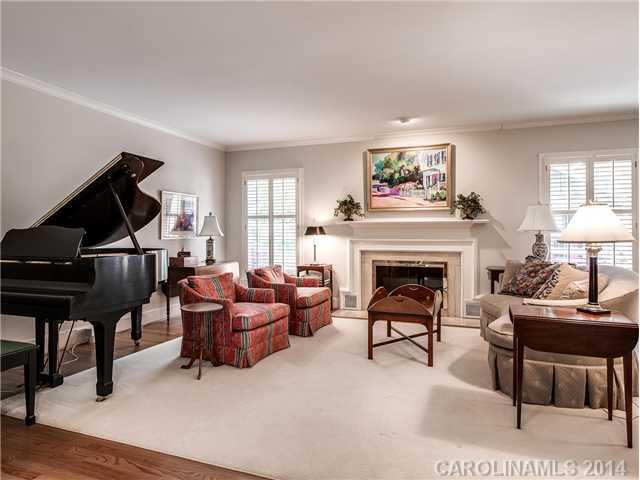 2935 Wheelock Road Charlotte, NC 28211 - Photo 5 of 16 a living room with furniture and a fireplace
