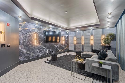 7400 River Road, Unit 317 North Bergen, NJ 07047 - Photo 30 of 41 a living room with furniture and a floor to ceiling window