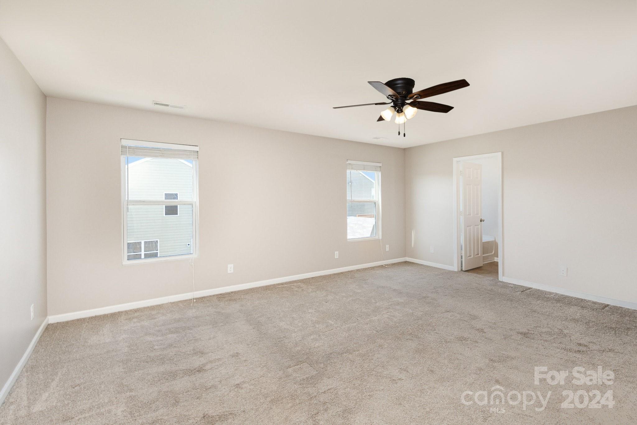 1005 Green Terra Road Indian Trail, NC 28079 - Photo 16 of 19 a view of an empty room with a window