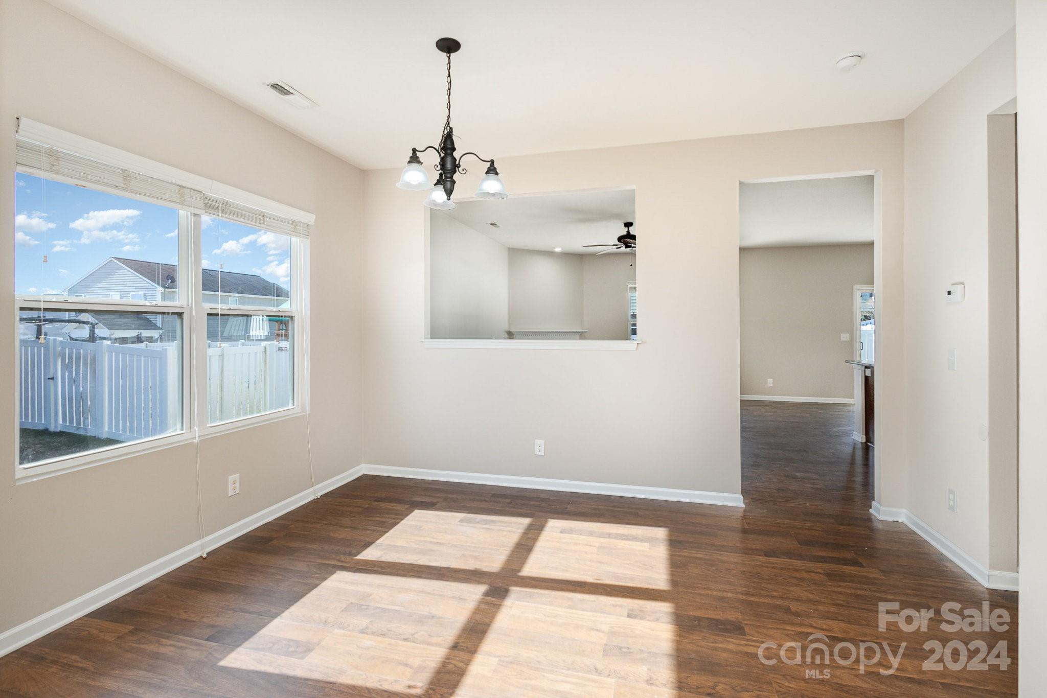 1005 Green Terra Road Indian Trail, NC 28079 - Photo 8 of 19 a view of an empty room with a window