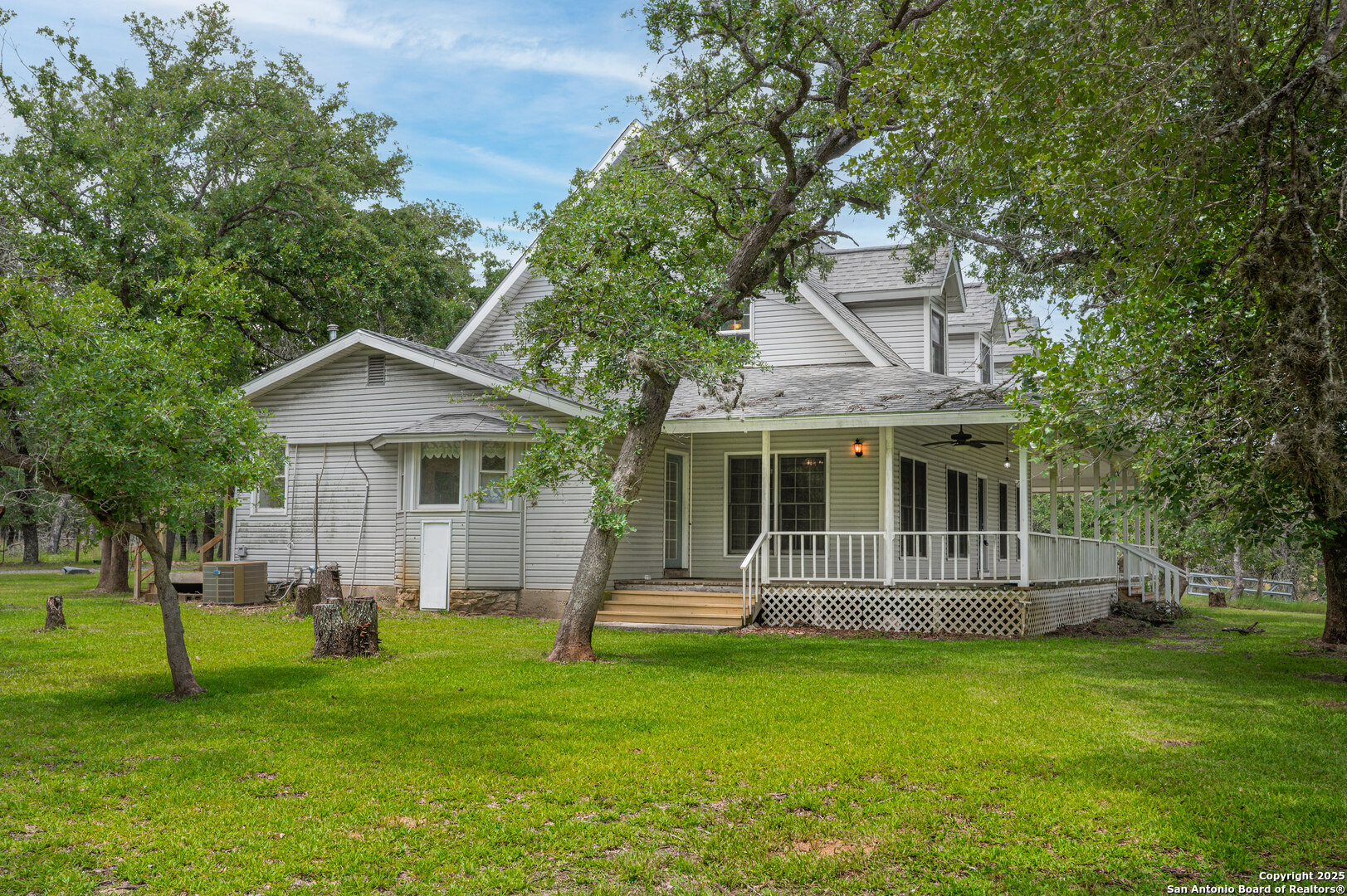 2981 Vivroux Ranch Road Seguin, TX 78155 - Photo 4 of 50 a front view of a house with a yard