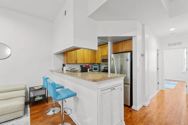 a room with a sink and a table in it