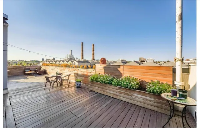 a view of a street with cars