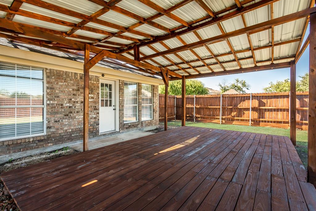 712 Billups Street Van Alstyne, TX 75495 - Photo 35 of 38 a view of porch with wooden floor