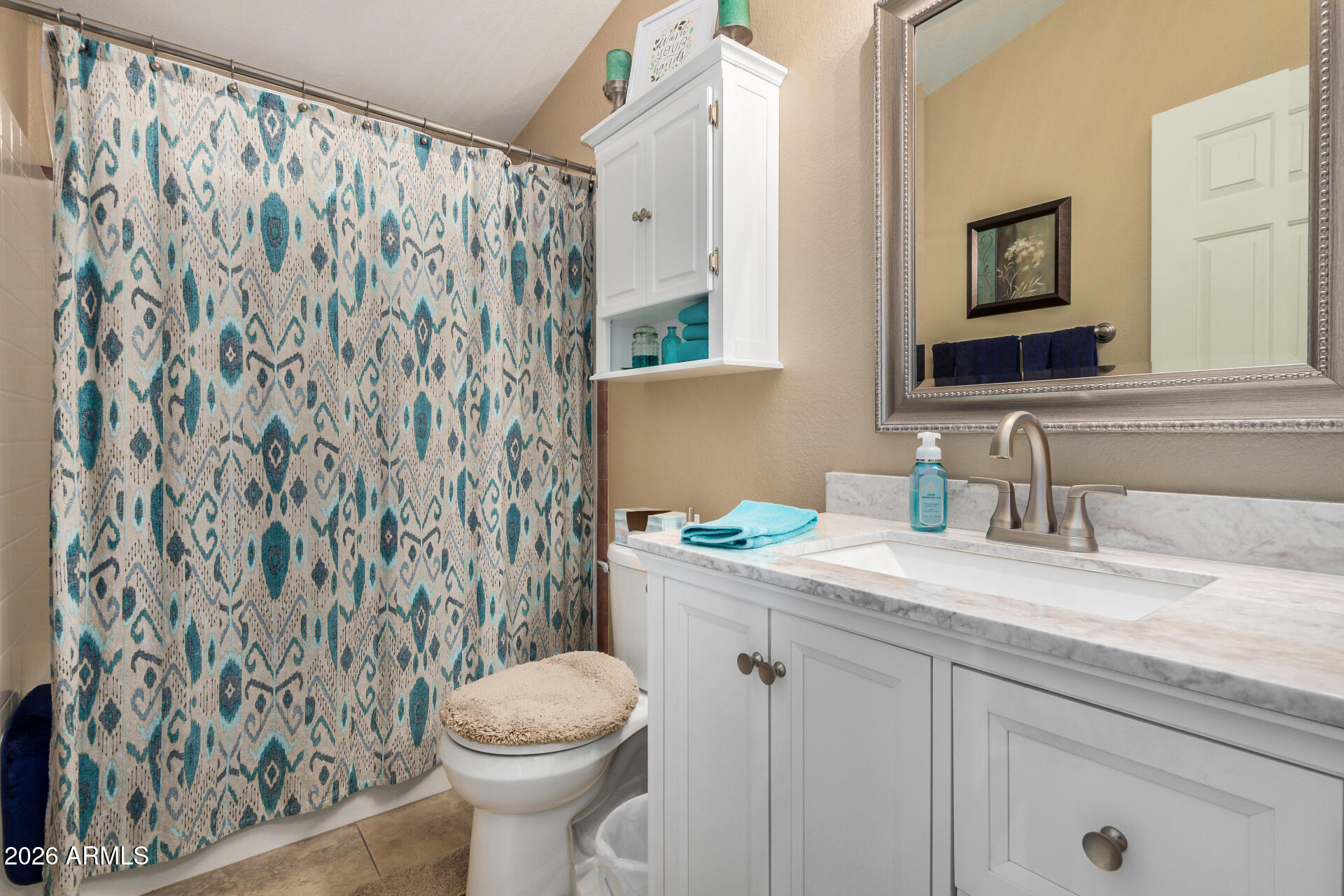 3301 South Goldfield Road, Unit 1006 Apache Junction, AZ 85119 - Photo 21 of 30 a bathroom with a granite countertop sink and a toilet
