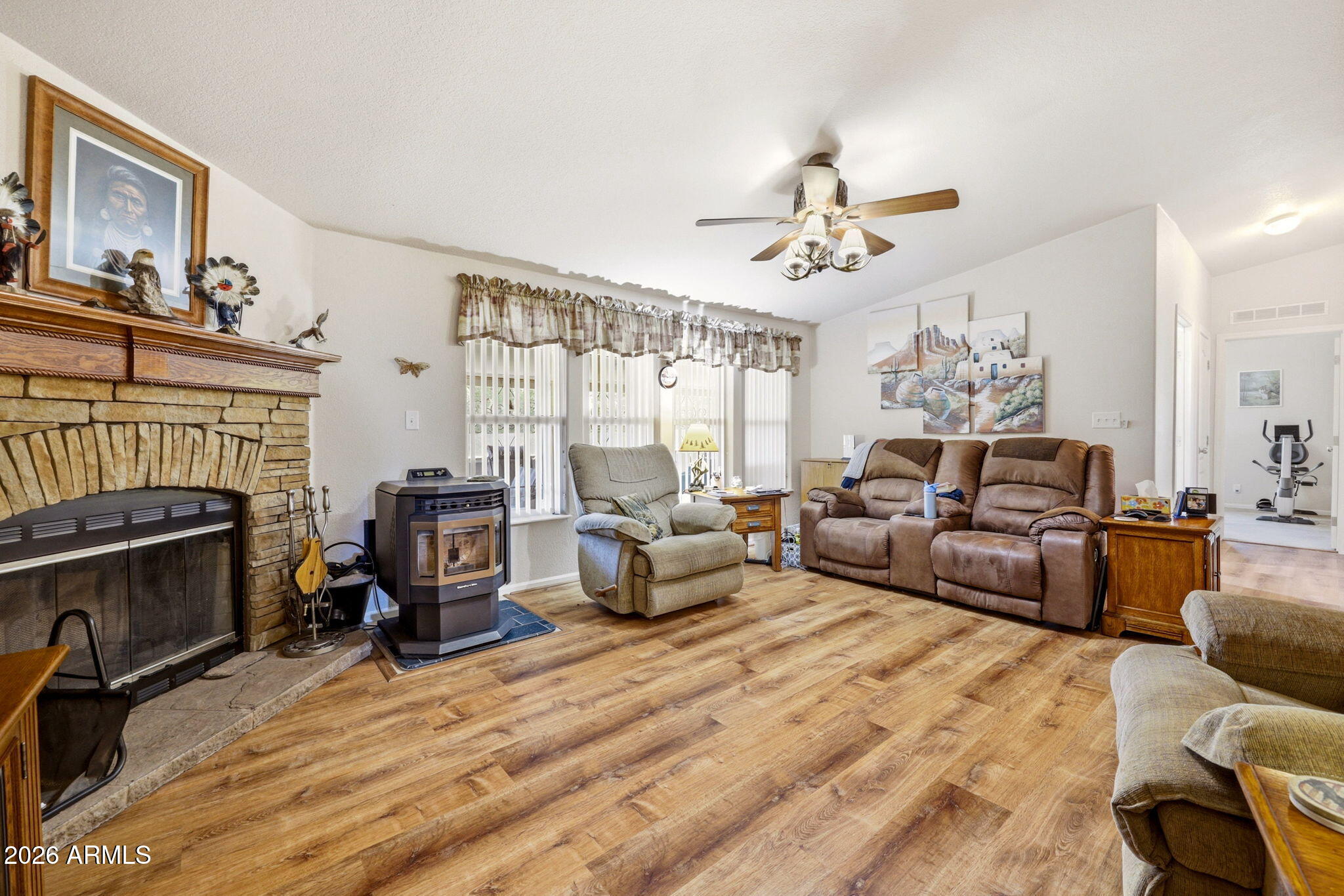 6 County Road Concho, AZ 85924 - Photo 9 of 39 a living room with furniture a fireplace and a flat screen tv