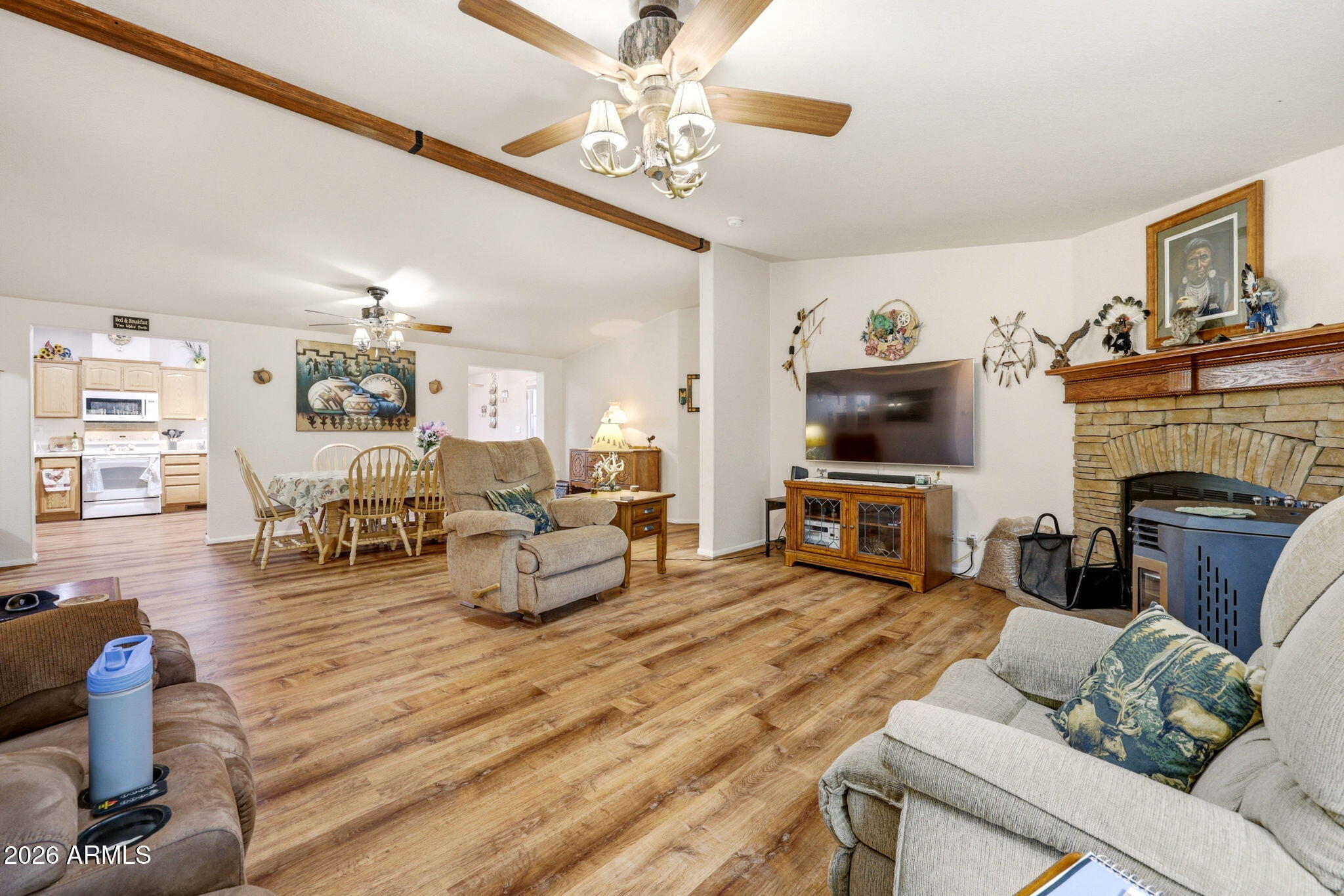 6 County Road Concho, AZ 85924 - Photo 10 of 39 a living room with furniture and a fireplace