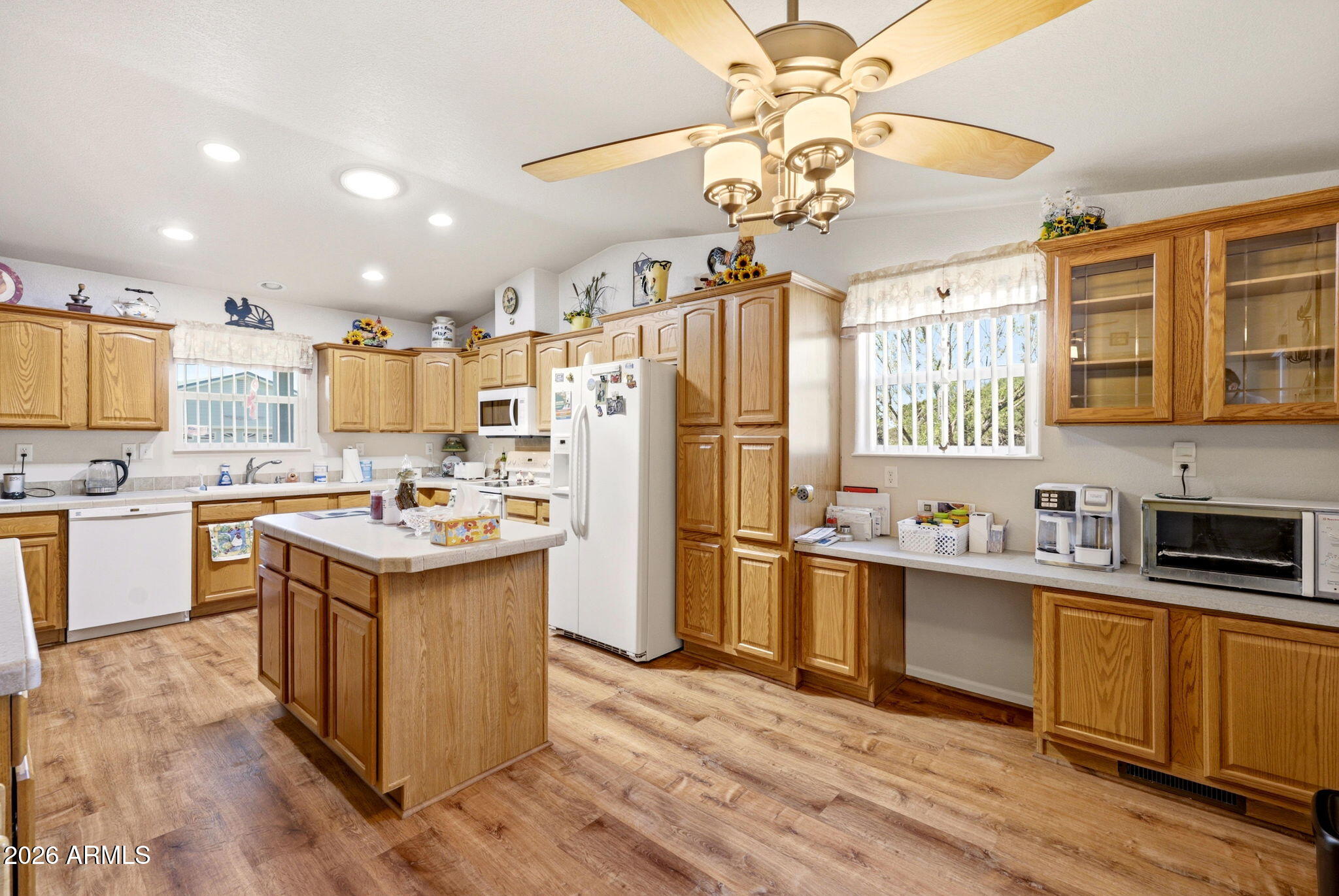6 County Road Concho, AZ 85924 - Photo 11 of 39 a kitchen with stainless steel appliances granite countertop a sink cabinets and wooden floor