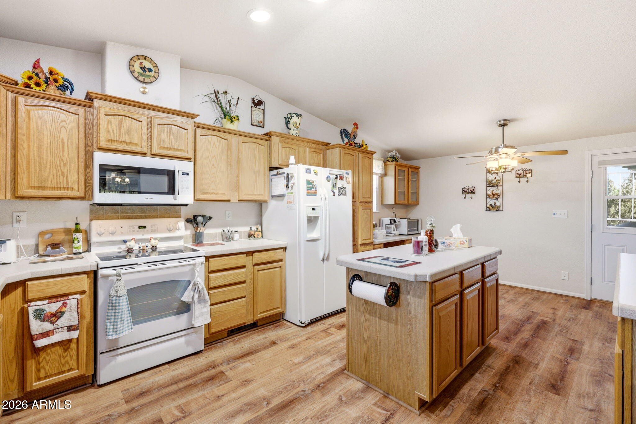 6 County Road Concho, AZ 85924 - Photo 12 of 39 a kitchen with stainless steel appliances granite countertop a stove and a refrigerator