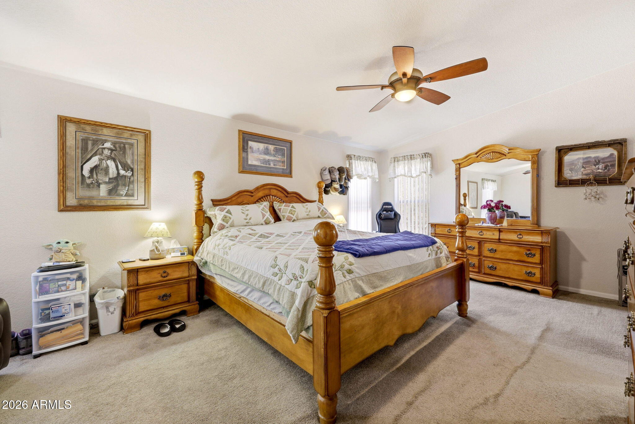 6 County Road Concho, AZ 85924 - Photo 15 of 39 a bedroom with a bed and a chandelier