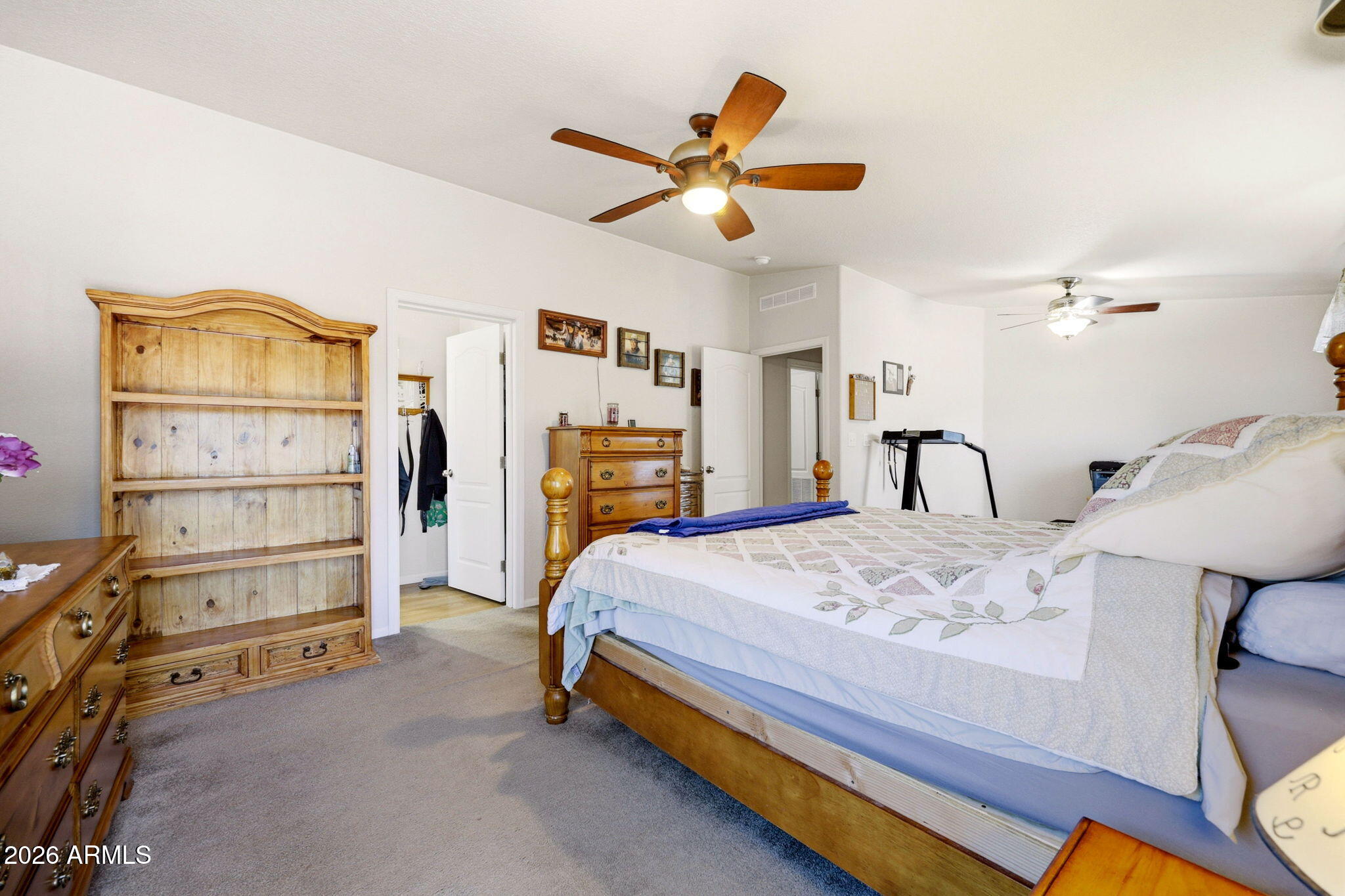 6 County Road Concho, AZ 85924 - Photo 16 of 39 a bed room with a bed and a ceiling fan