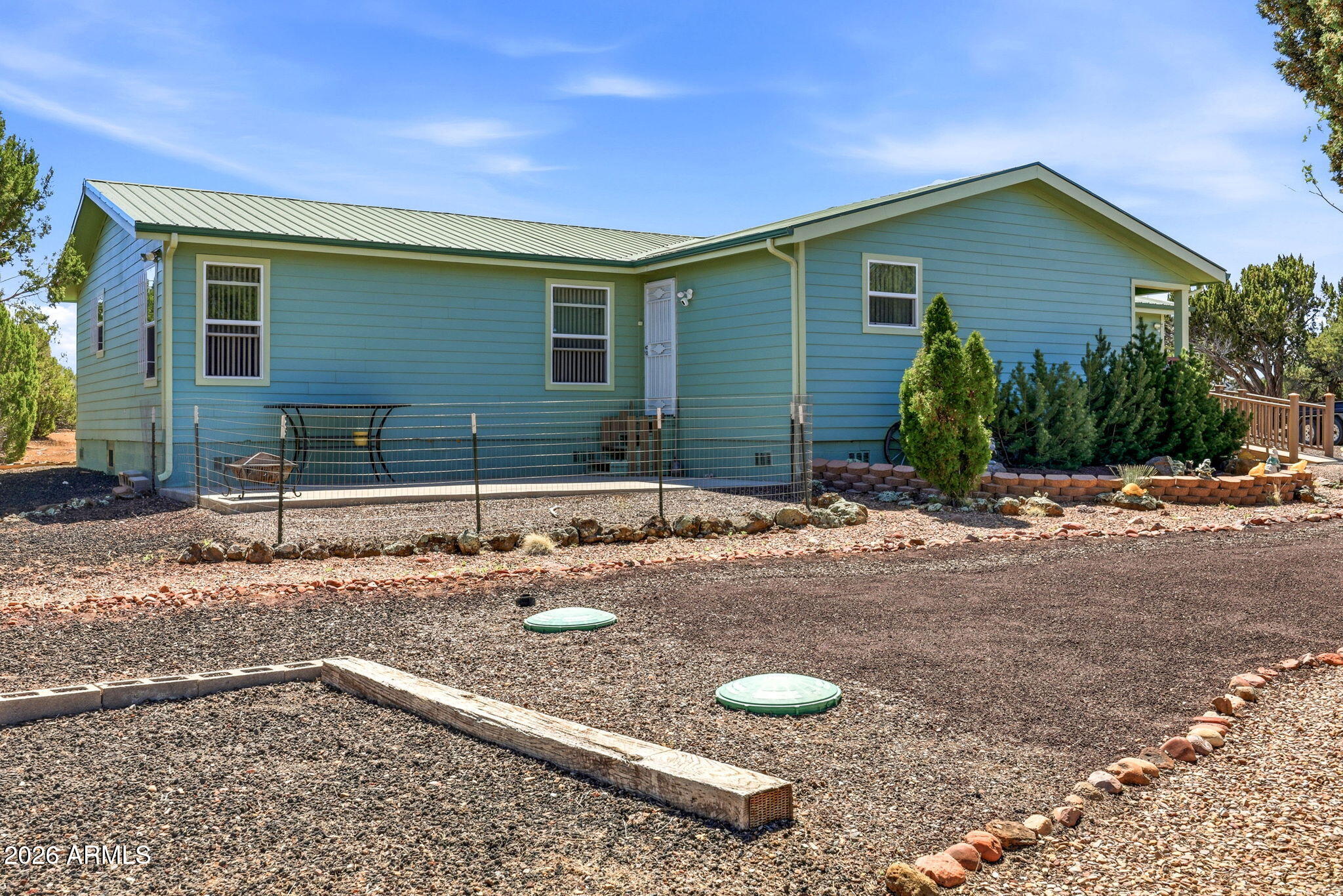 6 County Road Concho, AZ 85924 - Photo 25 of 39 a view of a house with backyard and sitting area