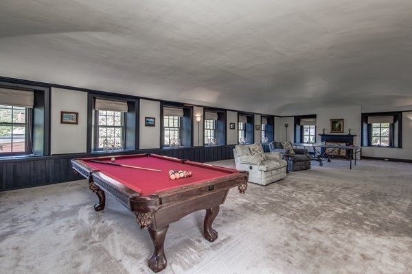 5 East Main Street Hopkinton, MA 01748 - Photo 16 of 20 a living room with furniture pool table and windows