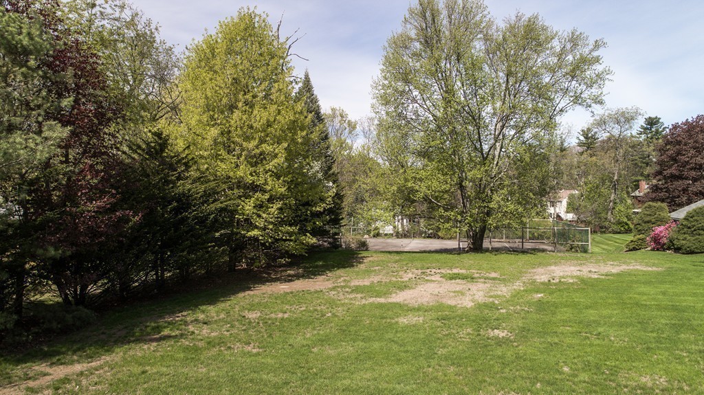 5 East Main Street Hopkinton, MA 01748 - Photo 18 of 20 a view of a trees with a yard
