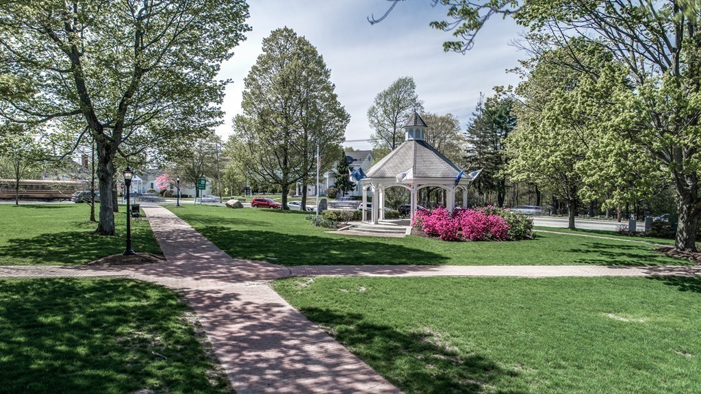 5 East Main Street Hopkinton, MA 01748 - Photo 19 of 20 a front view of a house with garden