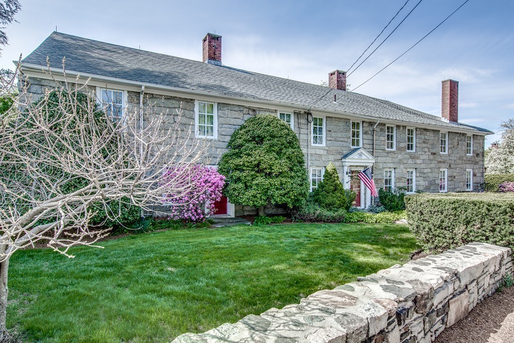 5 East Main Street Hopkinton, MA 01748 - Photo 20 of 20 a front view of a house with a garden
