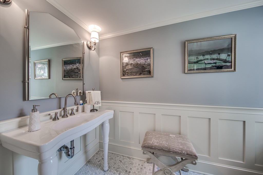 5 East Main Street Hopkinton, MA 01748 - Photo 5 of 20 a bathroom with a sink and a mirror