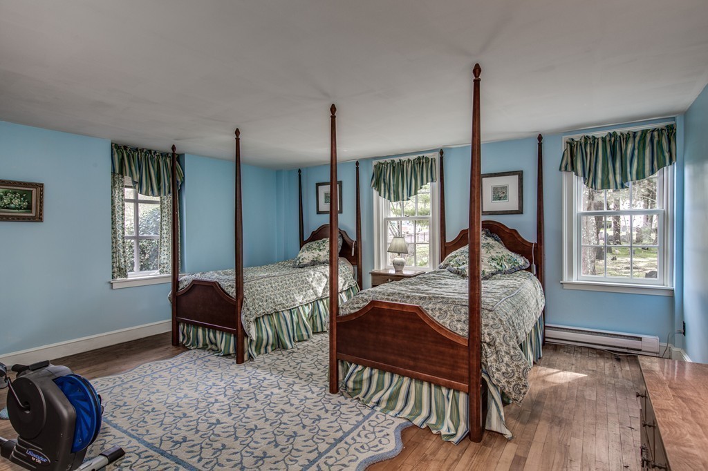 5 East Main Street Hopkinton, MA 01748 - Photo 10 of 20 a living room with furniture and a window