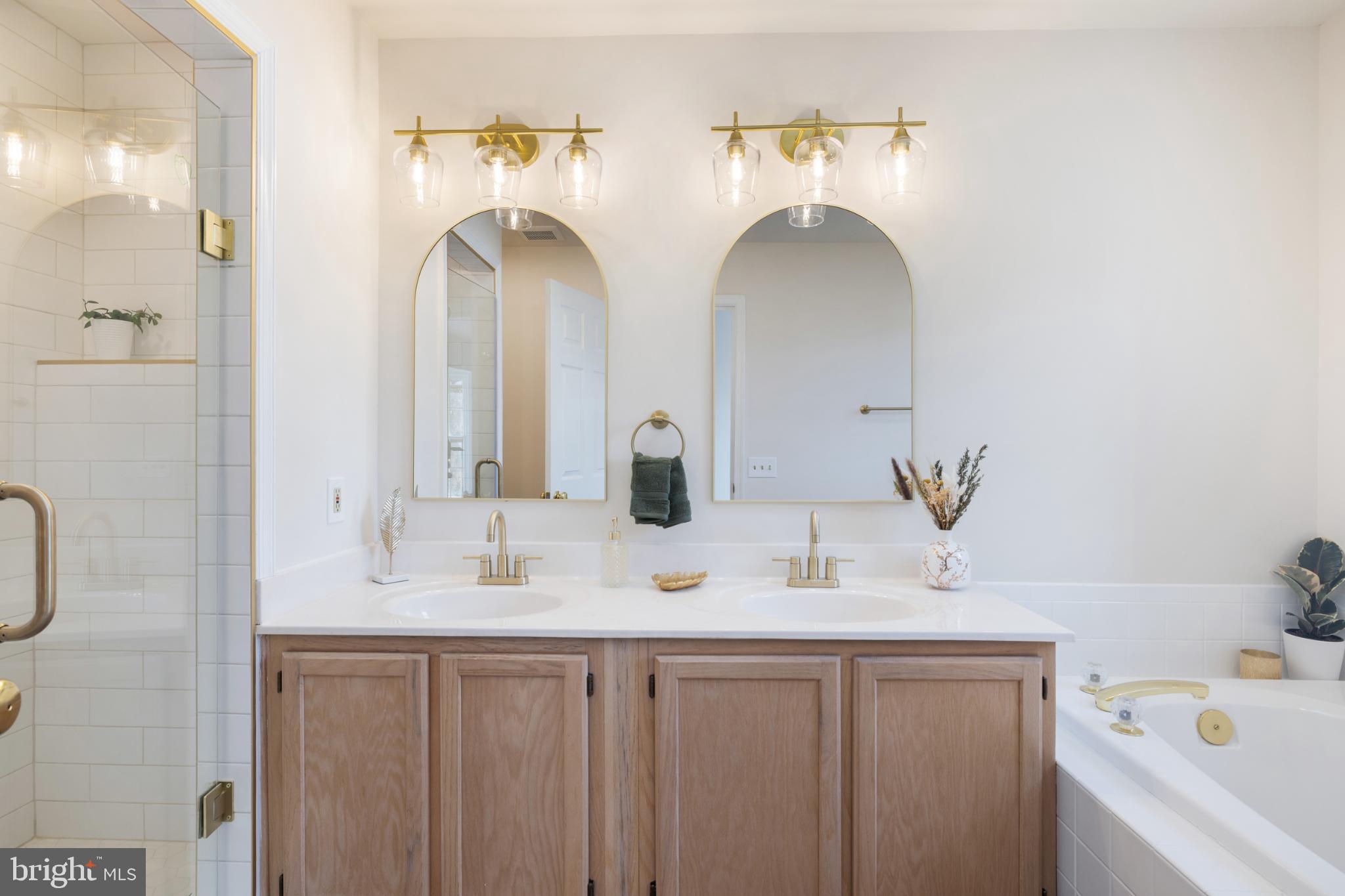 268 St Michaels Circle Odenton, MD 21113 - Photo 18 of 42 a bathroom with double vanity sink and a mirror