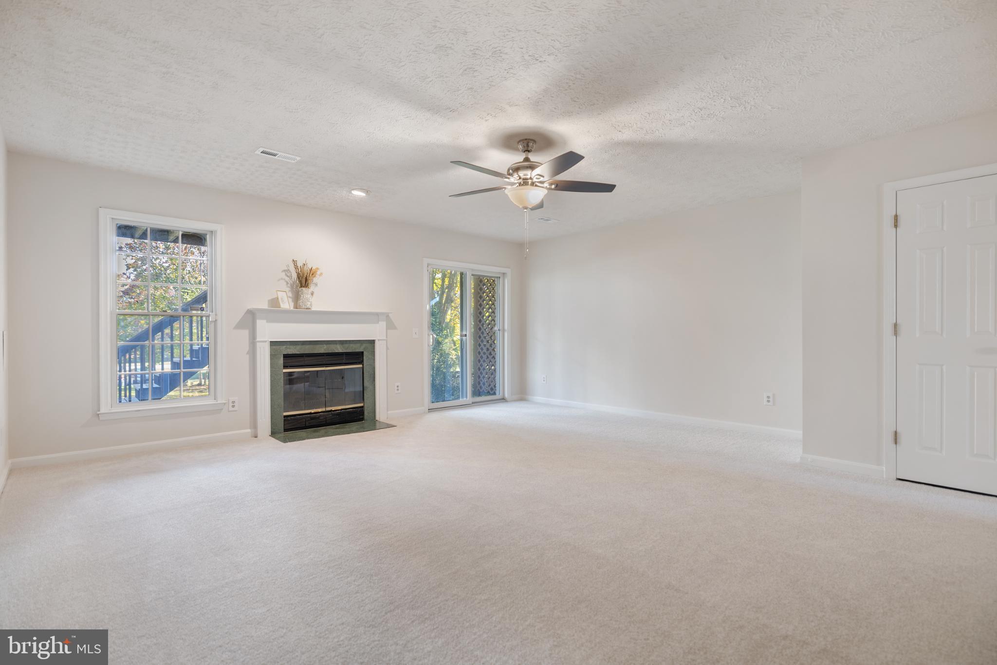 268 St Michaels Circle Odenton, MD 21113 - Photo 28 of 42 a view of empty room with a fireplace