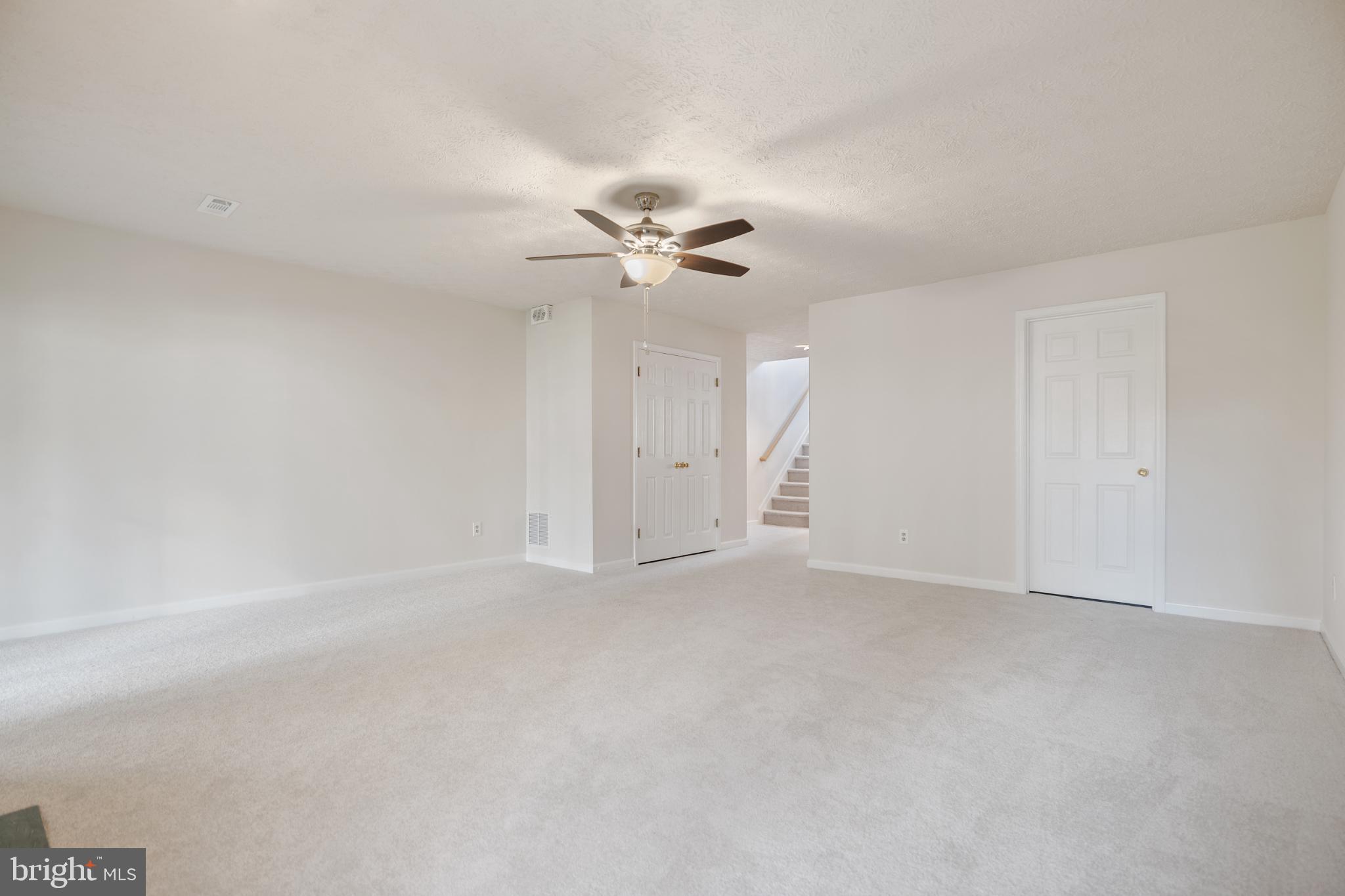 268 St Michaels Circle Odenton, MD 21113 - Photo 29 of 42 wooden floor in an empty room with a ceiling fan