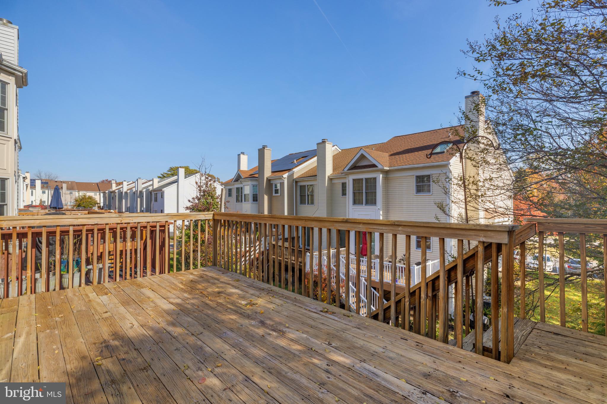 268 St Michaels Circle Odenton, MD 21113 - Photo 34 of 42 a view of balcony with wooden floor and fence