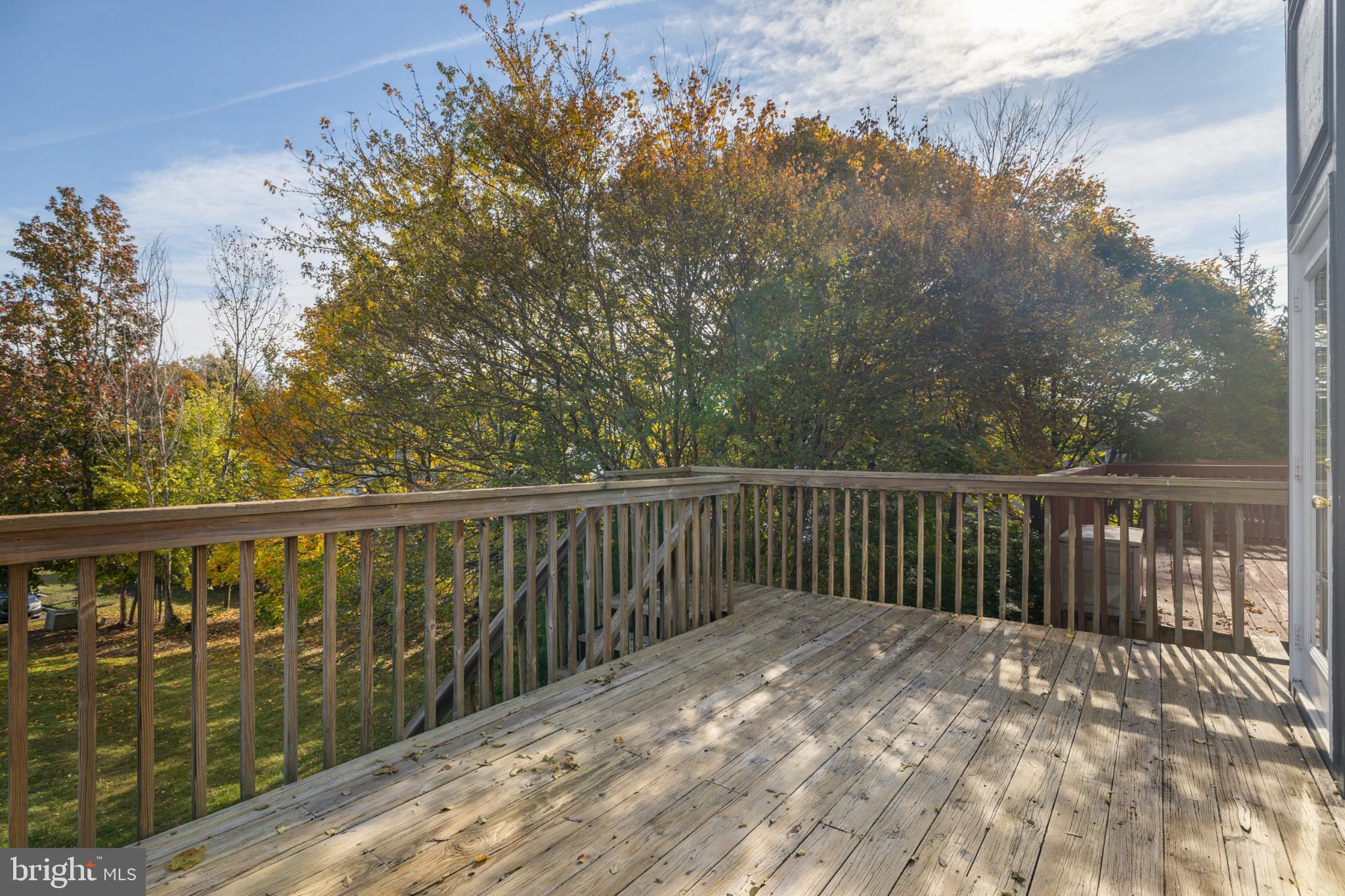 268 St Michaels Circle Odenton, MD 21113 - Photo 35 of 42 a view of balcony with wooden floor and fence