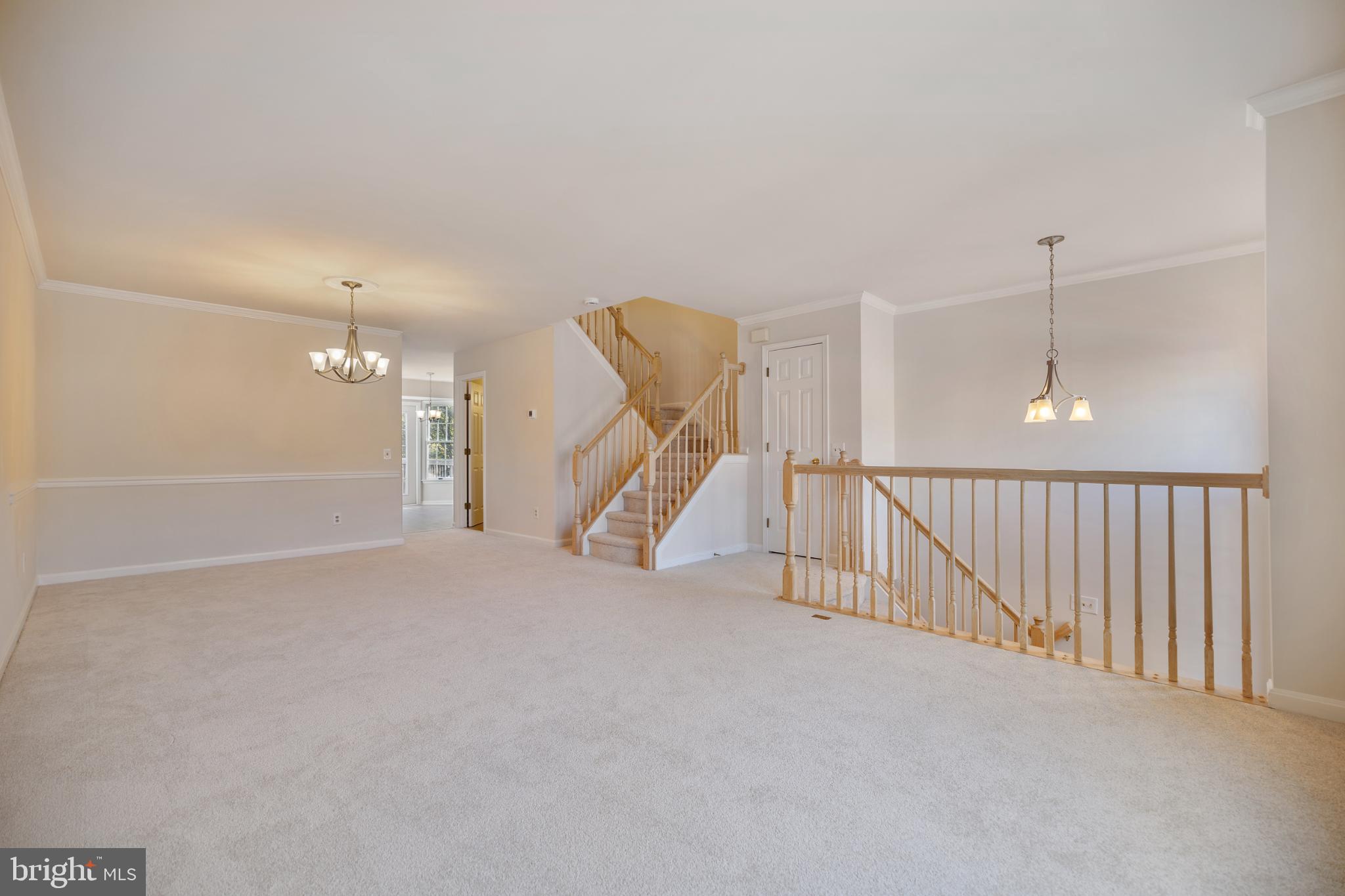 268 St Michaels Circle Odenton, MD 21113 - Photo 5 of 42 a view of an empty room with stairs