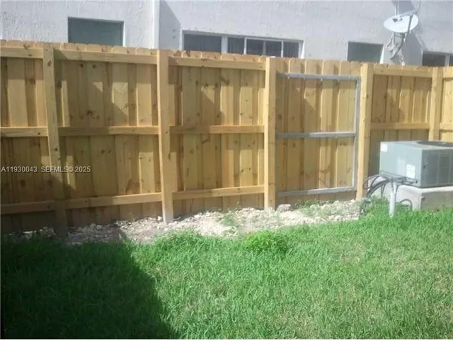 a view of a swimming pool with lounge chair