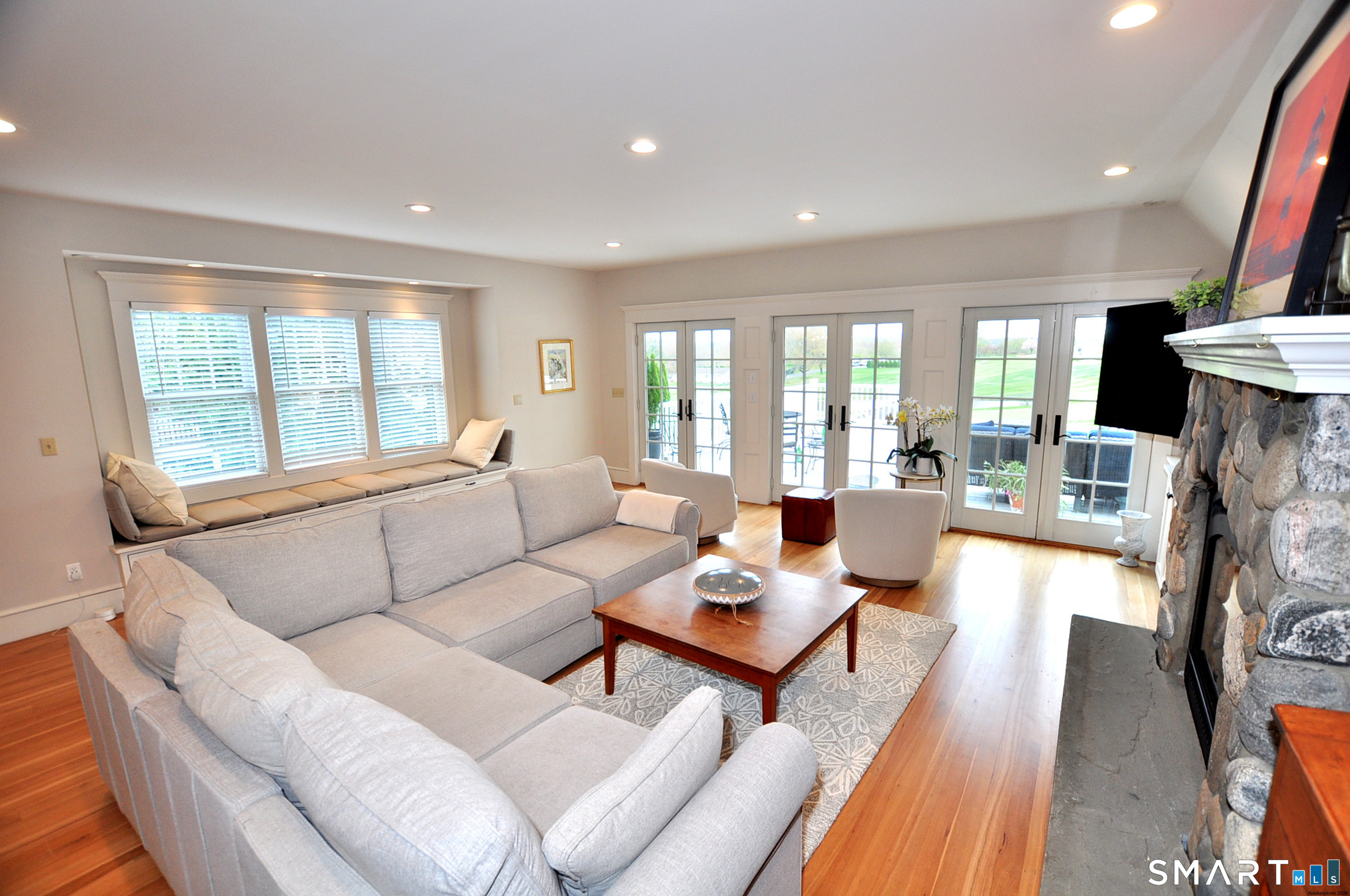 371 North Main Street Suffield, CT 06078 - Photo 12 of 39 a living room with furniture and a large window