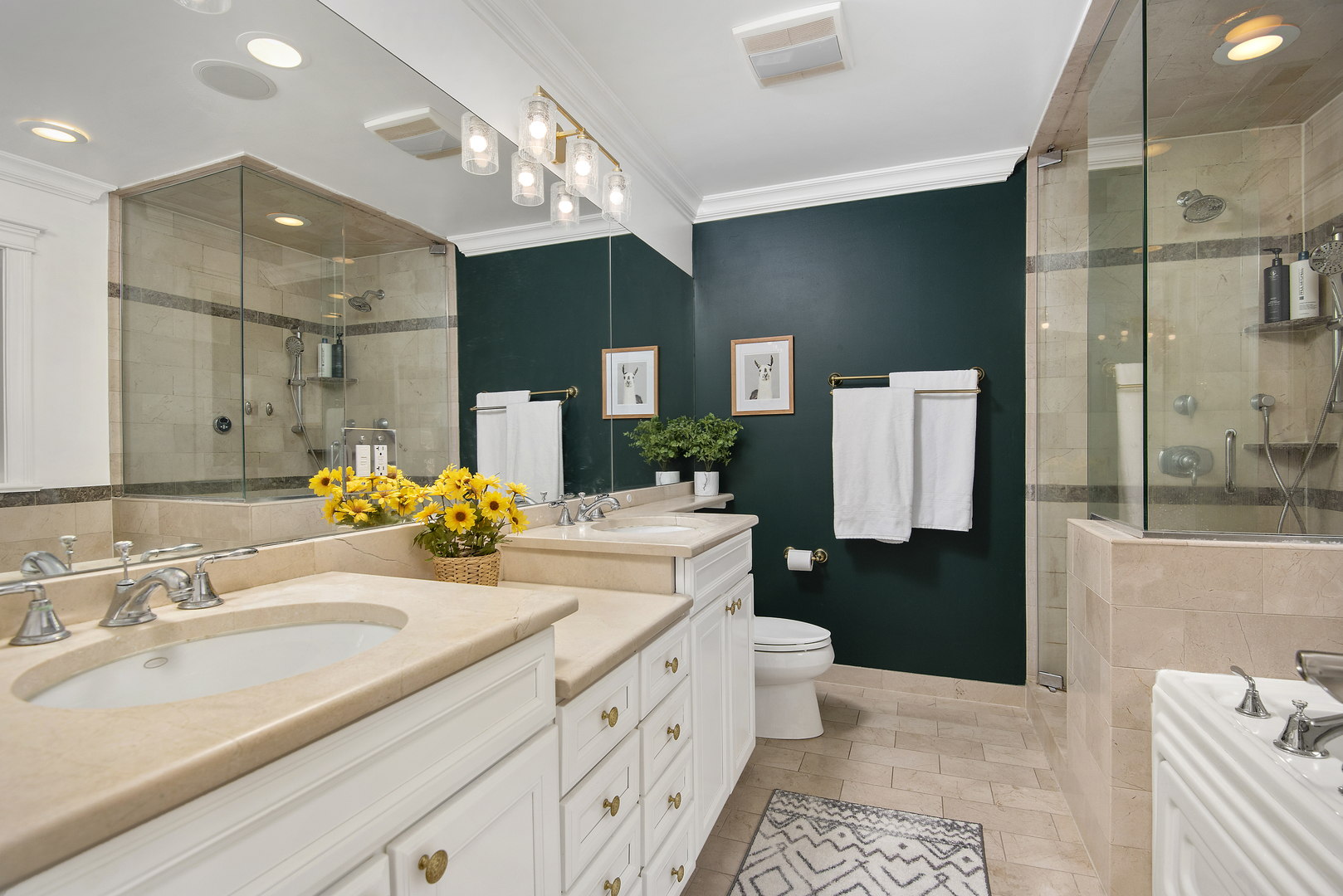 902 West Roscoe Street, Unit 2 Chicago, IL 60657 - Photo 11 of 14 a bathroom with a sink double vanity and a shower